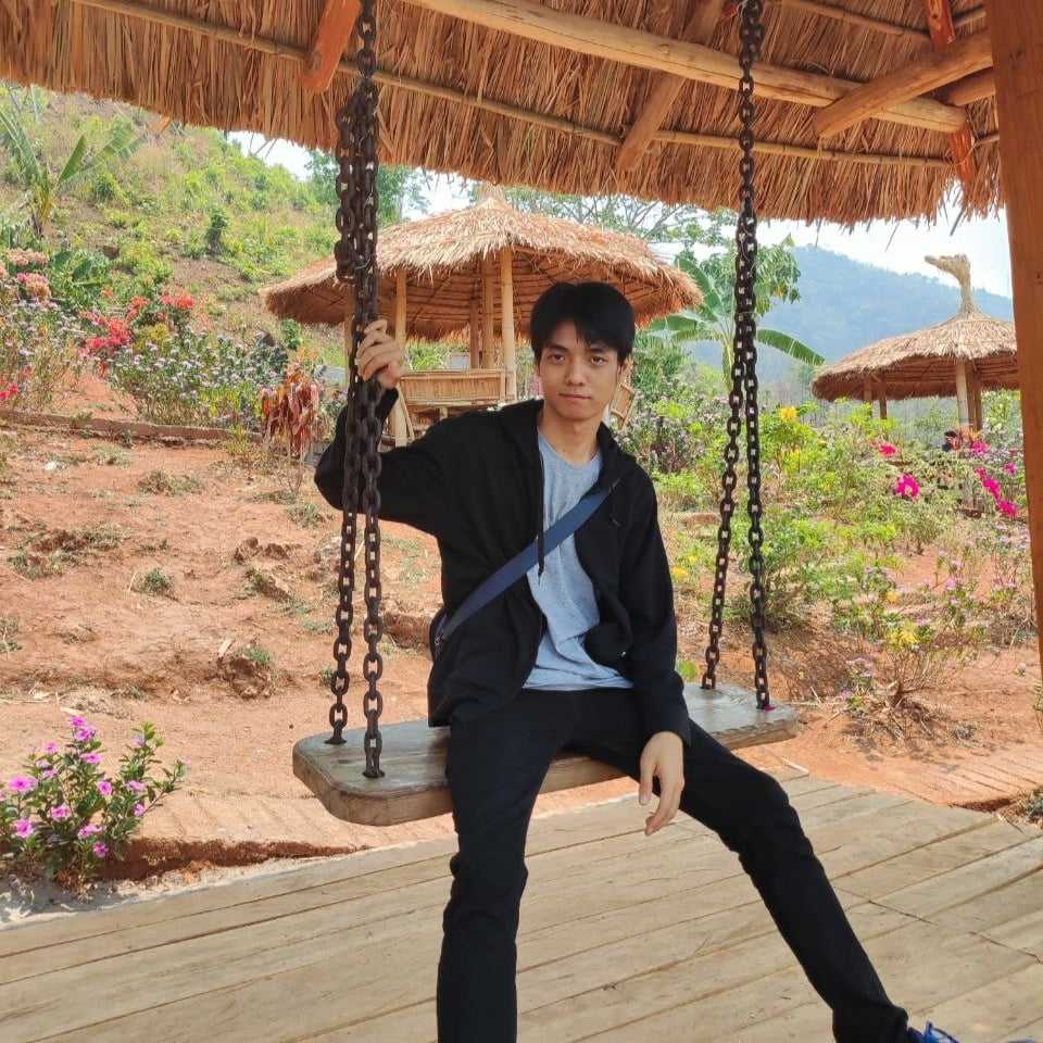 portfolio owner sitting on a swing